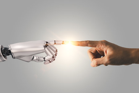 Business man and robot hand touching with flare light. AI artificial intelligence concept, big data, science, innovation technology, cloud computing, futuristic, internet network communicationの写真素材