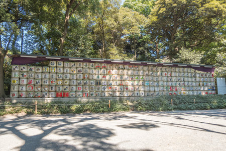 Tokyo, Japan - July 29. 2023: Sake barrels at Meiji Jingu Shrine, Shibuya, Tokyo, Japan.のeditorial素材