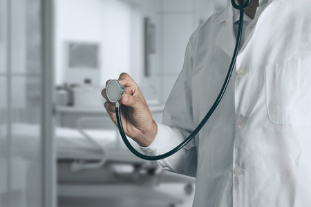Doctor using stethoscope for listening heart sound in human body. Medical and healthcare conceptの写真素材