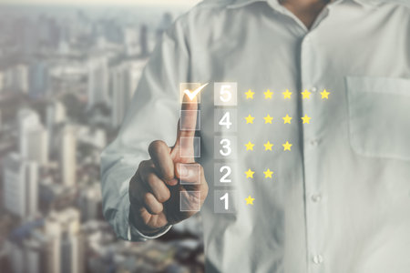 Business man point five stars survey rating icon for customer satisfaction scores. customer satisfaction concept.の写真素材