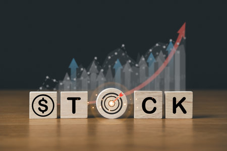 Business stock with wooden blocks and growth graph background. Business marketing and Corporate Success Strategy concept.の写真素材