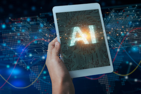 Businessman using AI on tablet. Futuristic Innovation with Robot AI artificial intelligence technology conceptの写真素材