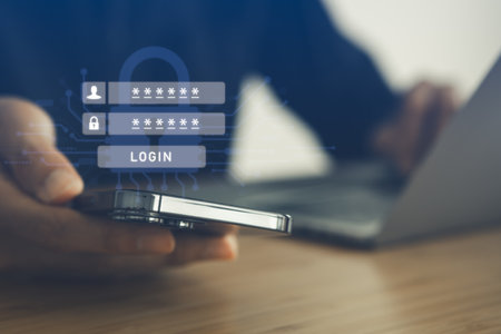 Businessman using mobile phone for login the ntwork with cyber security  icons. Digital information technology and  cyber security concept.の写真素材