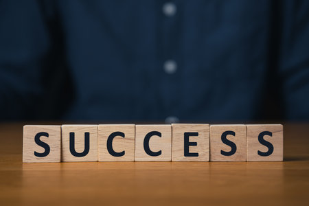 Business success text on wooden block for business target and goal conceptの写真素材