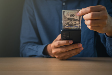Global Economic and exchange rate on currency stock market. business man holding banknote and using...