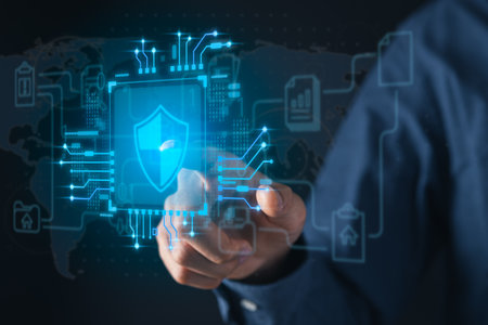 Businessman holding cyber security icons screen. Digital information technology and cyber security concept.の写真素材