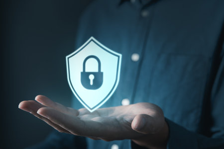 Businessman holding cyber security icons screen. Digital information technology and cyber security concept.の写真素材