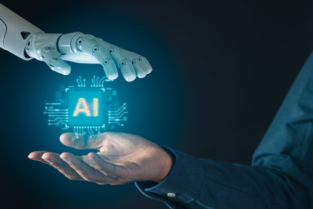 Robot hand and businessman hand holding digital screen of AI artificial intelligence for futuristic...