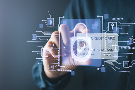 Businessman using mobile phone and holding credit card. Digital information technology and cyber security concept.の写真素材