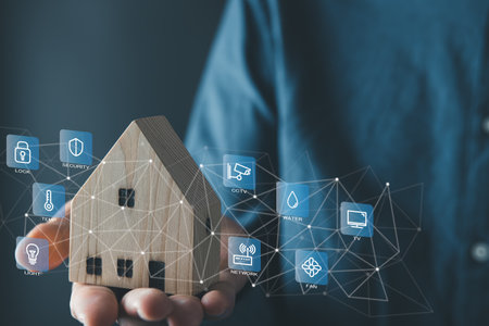 Man use manage smart home features including security, lighting, and temperature. Smart home and Iot concept.の写真素材