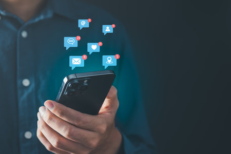 Businessman receiving multiple social media notifications on smartphone. social media concept.の写真素材