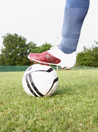 Footballer stopping a ballの写真素材