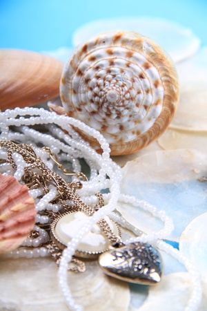 shells and pearl jewellery together with a nice blue washed out colourの写真素材