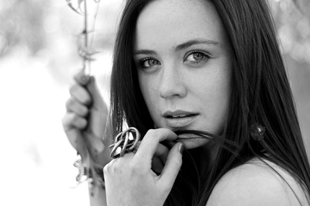 A prefect model hold her hair and give an exceptional look for a model.の写真素材