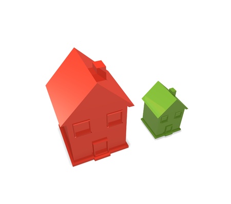 a big red house and a small green house stand next to each other for comparison of sizeの写真素材