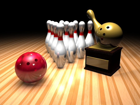 a bowling scene in a bowling alley with a bowling ball, skittles and a gold bowling trophy.の写真素材