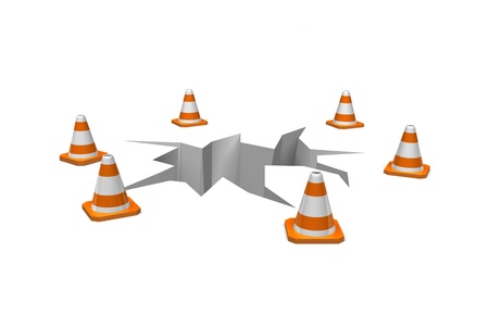 cones surround a crack in the ground as a warningの写真素材