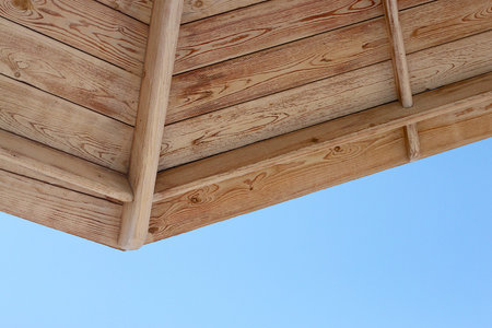 Part of a wooden beach umbrella