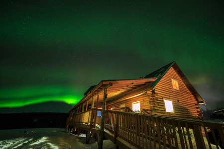 wooden house, Aurora, night sky at alaska, fairbanksのeditorial素材