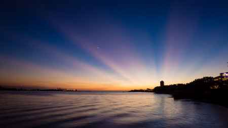 Sun set with sun rays at Tamsui, Taiwanの写真素材