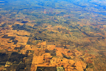 Aerial view of some lands in airplaineの写真素材