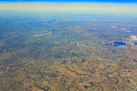 Aerial view of some lands in airplaineの写真素材