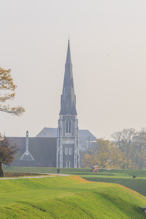 Traveling in the famous St Alban's Church, Copenhagen around Autumn seasonの写真素材