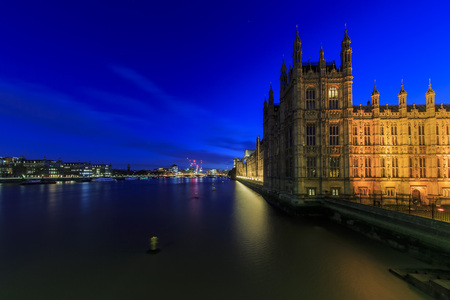 Traveling in the famous Big Ben, London, United Kingdom around twilightの写真素材