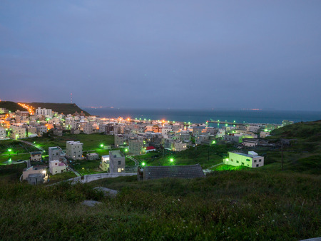 Night scene of fishing port at Penghu island of Taiwanの写真素材