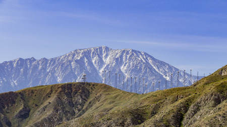 Windmill and snow mountain at Whitewater, Palm Springs, Californiaの写真素材