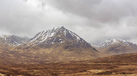 Beautiful country side view with mountain at Highland, Scotlandの写真素材