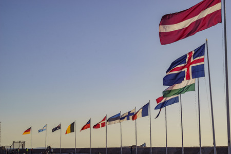 Europe country flags swinging saw at harbour of Helsingborg, Swedenのeditorial素材