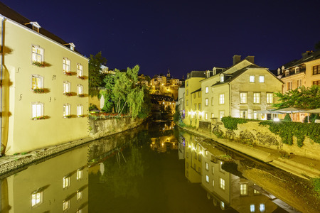 Alzette river side scene on road Rue Munster of Luxembourg at nightのeditorial素材