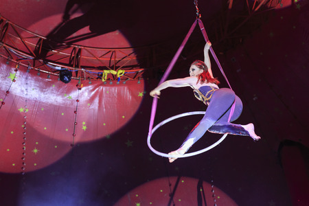 Bognor Regis, APR 10: The fun Zyair Circus show with woman playing Hula Hoop in air on APR 10, 2016 at Bognor Registのeditorial素材