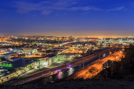 Beautiful Los Angeles river sunset view with police car below