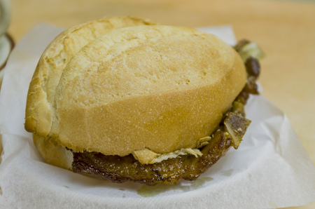 A pork chop bun is one of the most popular and famous snacks in Macau.の写真素材