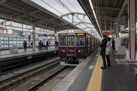 Ibaraki, DEC 20: Train station platform and train coming on DEC 20, 2016 at Ibaraki, Japanのeditorial素材