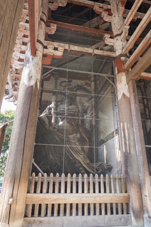 Statue in the famous and historical TodaiJi of Nara Park at Nara, Japanのeditorial素材