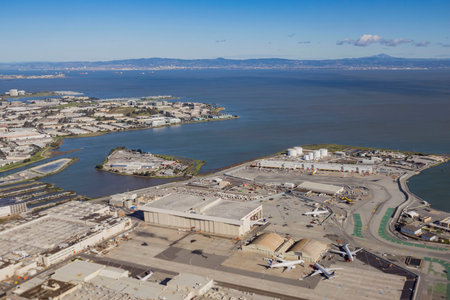 San Francisco, DEC 16: Airplane, airport and bay area at San Francisco Airport, California