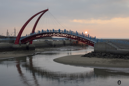 Sunset view of the beautiful Rainbow Bridge at Yuanli, Taiwanの写真素材