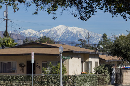 Temple City, JAN 30: House with snowy Mt. Baldy behind on JAN 30, 2017 at Temple City, Californiaのeditorial素材