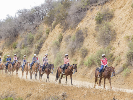 Los Angeles, JUL 20: Horseback riding in Hollywood Hills trail on JUL 20,2014 at Los Angelesのeditorial素材