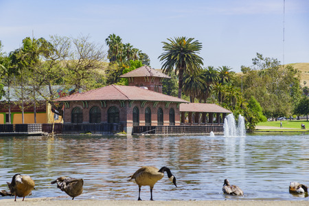 Beautiful red building with birds at Lincoln Park, Los Angeles, Californiaの写真素材