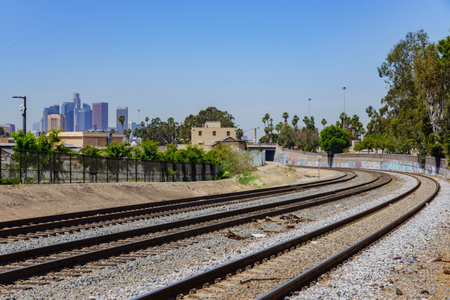 Afternoon view of a curve railway and Los Angeles skyline