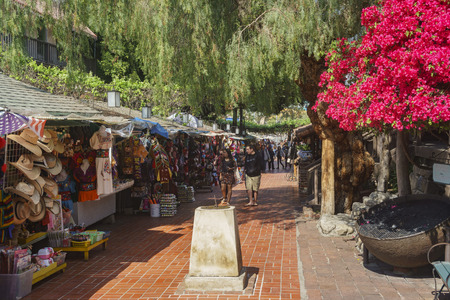 Los Angeles, APR 11: The famous Olvera Street with paper flower blossom and sun dial on APR 11, 2017 at Los Angelesのeditorial素材