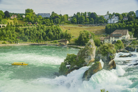 The biggest waterfall - Rhine Falls with ship at Europe, Zurich, Switzerlandのeditorial素材