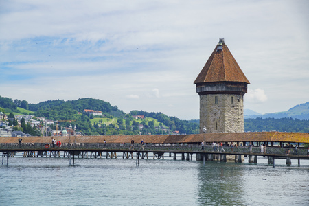 Lucerne, JUL 16: The beautiful Chapel Bridge and cityscape on JUL 16, 2017 at Lucerne, Switzerlandのeditorial素材
