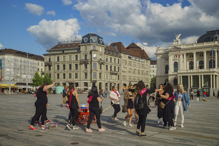 Zurich, JUL 15: Bride and friends in front of the beautiful Opera House on JUL 15, 2017 at Switzerlandのeditorial素材