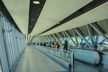 Gatwick, JUL 14: People walk toward the gate of northern terminal on JUL 14, 2017 at Gatwick, United Kingdomのeditorial素材