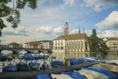 Zurich, JUL 15: Afternoon cityscape with Great Minster, Limmat river on JUL 15, 2017 at the historical Zurich city, Switzerlandのeditorial素材
